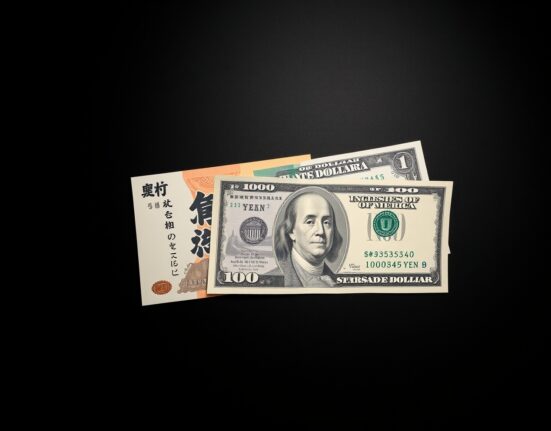 Japanese Yen and US Dollar banknotes on a desk representing currency exchange rate analysis.