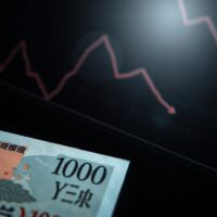 Japanese yen banknote with declining chart symbolizing weak currency outlook