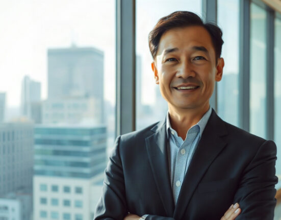 Justin Sun, TRON founder, speaking confidently in a modern office setting.
