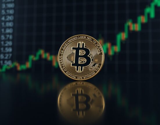 Bitcoin coin with stock chart in background, symbolizing price analysis and market trends.