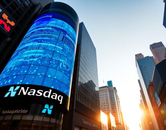 Exterior of the Nasdaq MarketSite building in New York City at golden hour with digital blockchain patterns on its display.