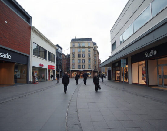 Empty shopping street in Oslo, Norway, reflecting subdued retail activity