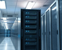 Data center racks with advanced AI hardware, highlighting Nvidia's system-level approach.
