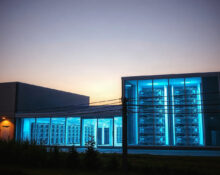 Modern data center with power infrastructure at dusk, representing Nvidia's investment in Cloverleaf.