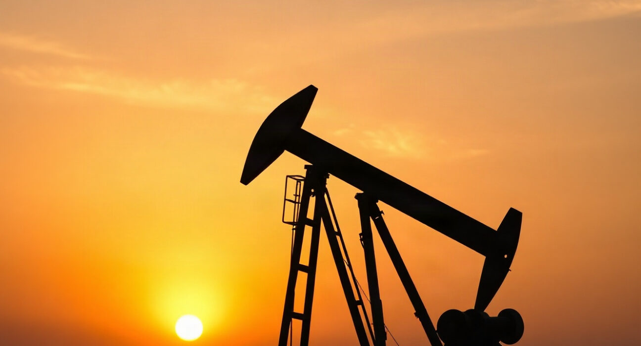 Oil pumpjack silhouette at sunset, symbolizing energy markets amid geopolitical tension.
