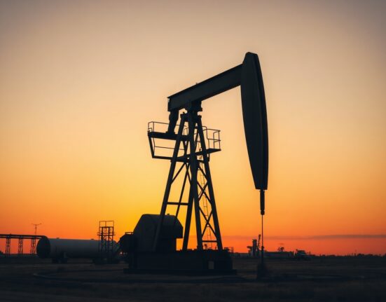 Oil pumpjack silhouette at sunset representing tight summer supply balances and price support forecast by TD Securities