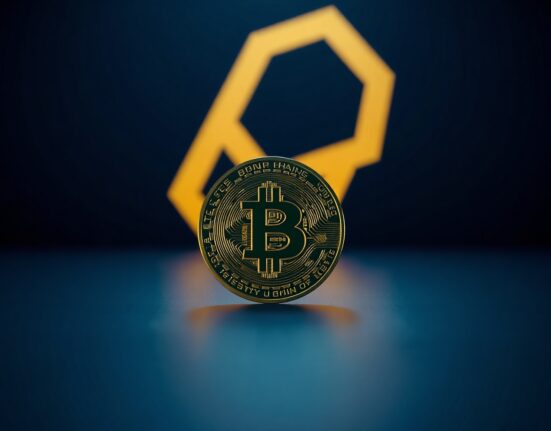 A digital representation of Ondo Finance's USDY stablecoin on a reflective surface with the BNB Chain logo in the background.