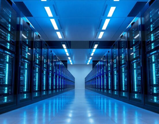 Modern data center with blue-lit server racks representing OpenAI's new GPT-5.6 AI model infrastructure