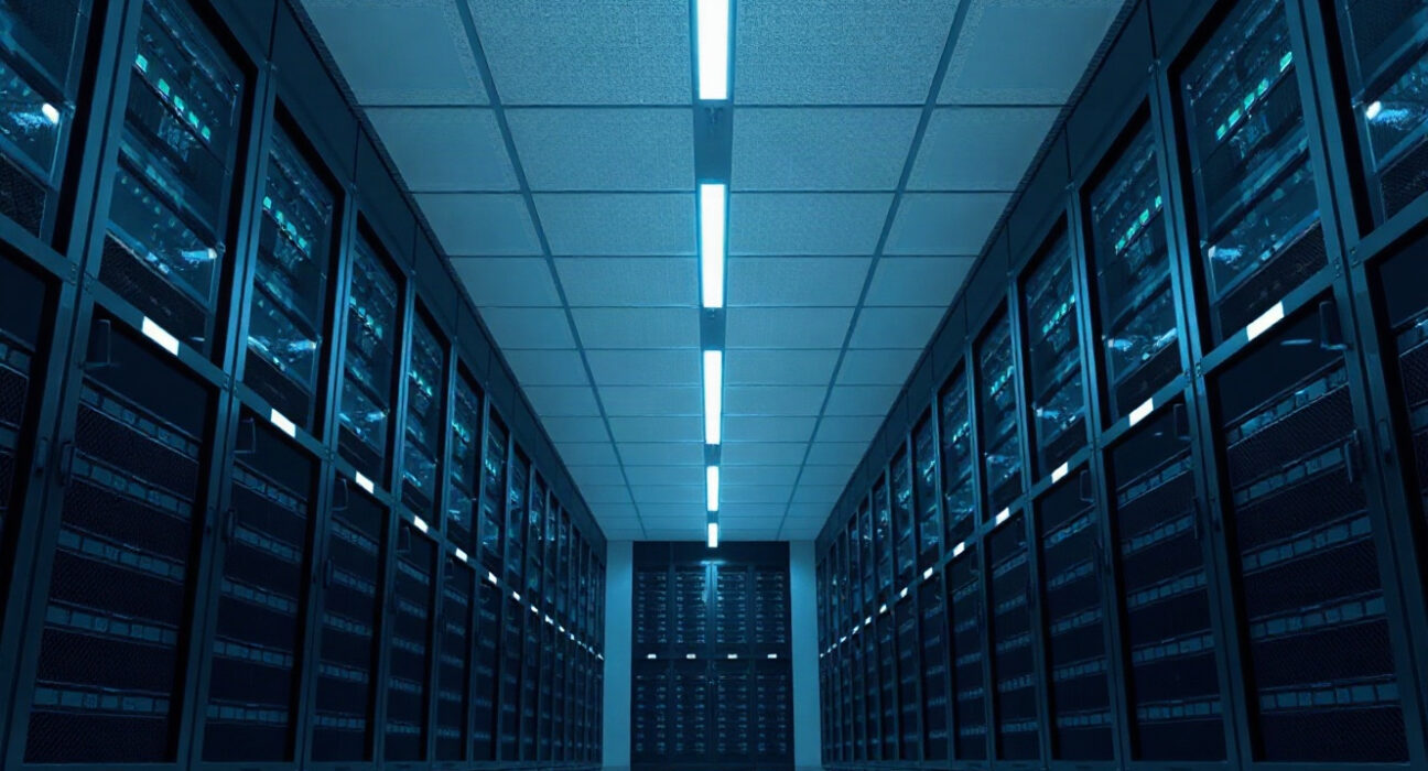 Interior of a modern data center with rows of servers, symbolizing OpenAI's infrastructure challenges.