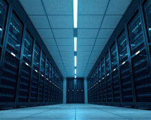 Interior of a modern data center with rows of servers, symbolizing OpenAI's infrastructure challenges.