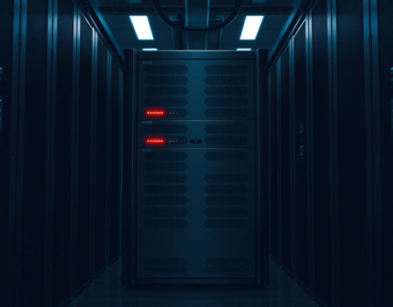 OpenAI Sora shutdown decision represented by deactivated AI server infrastructure in data center