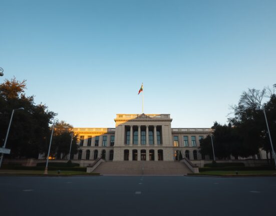 Pakistan Parliament building in Islamabad under clear blue sky, symbolizing diplomatic readiness for US-Iran talks.