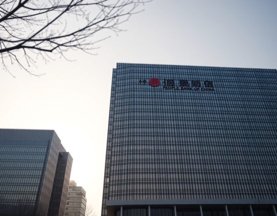 People's Bank of China headquarters building on a clear day in Beijing