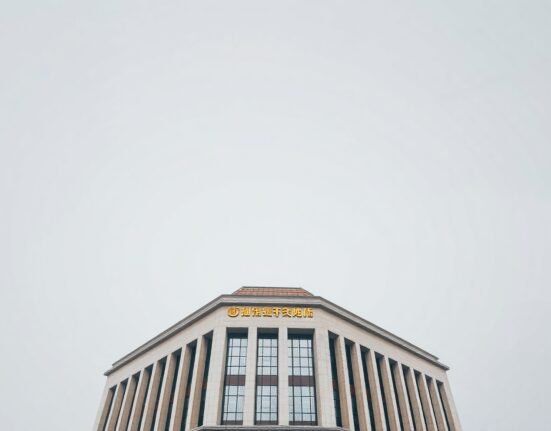 People's Bank of China headquarters in Beijing under overcast sky