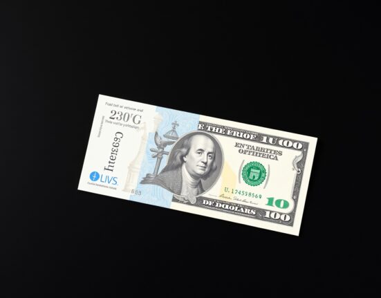 British pound and US dollar banknotes on a dark surface, representing currency exchange market movements.