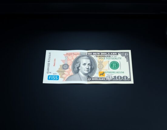 British Pound and US Dollar banknotes on a desk representing forex market analysis.