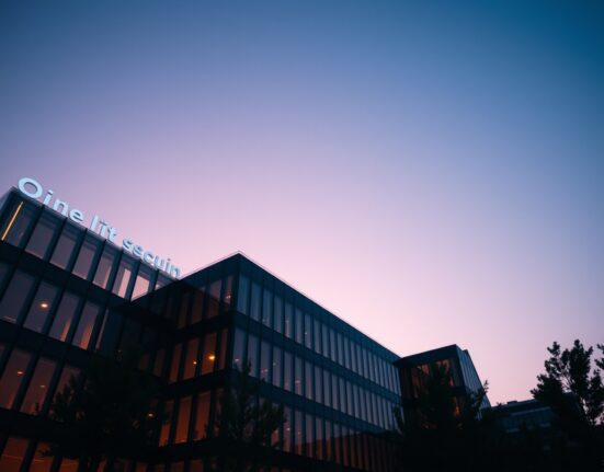 ProCap Financial corporate headquarters with a Bitcoin symbol overlay at dusk