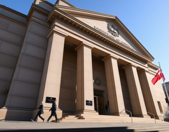Reserve Bank of Australia building in Sydney on a clear morning, symbolizing monetary policy decisions.