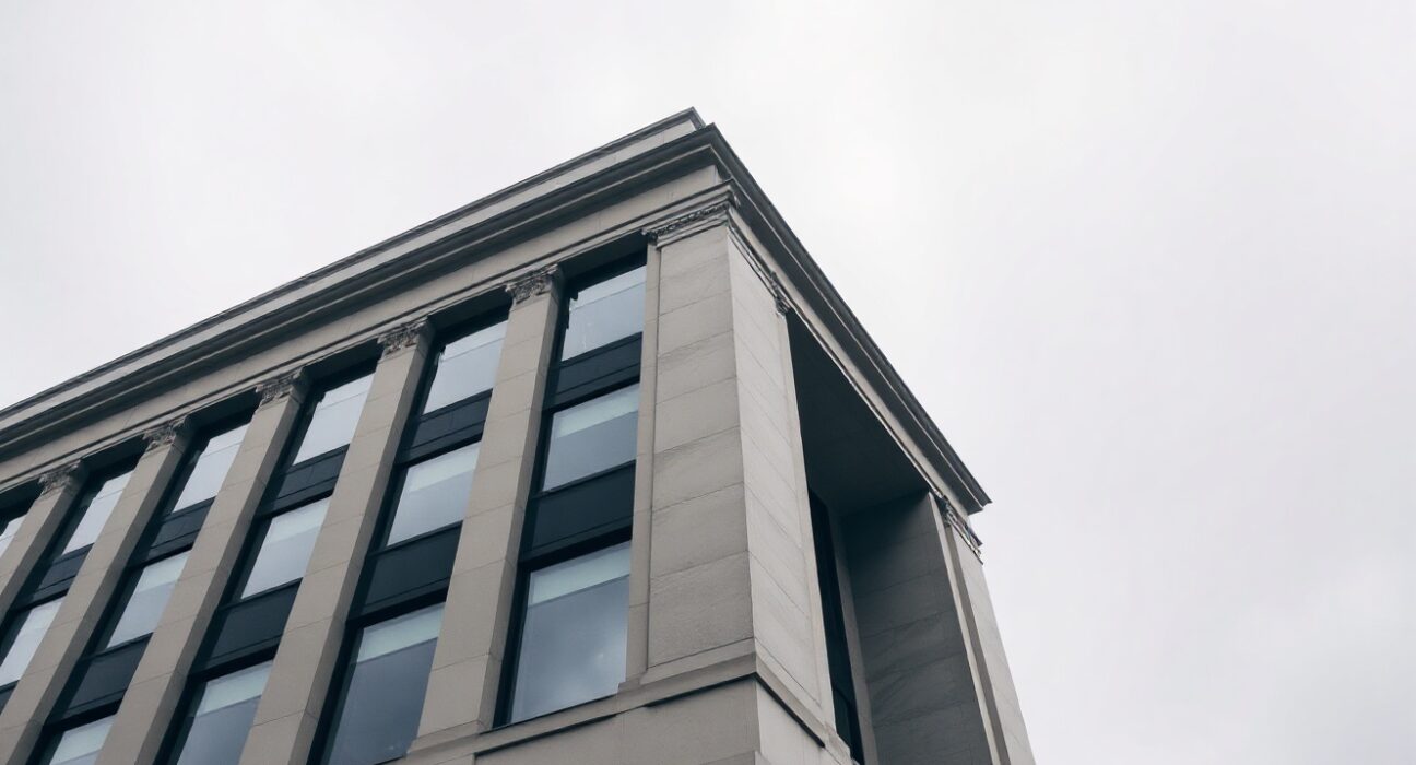 Exterior of the Reserve Bank of New Zealand building in Wellington on a cloudy day