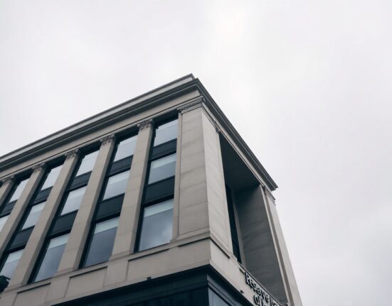 Exterior of the Reserve Bank of New Zealand building in Wellington on a cloudy day