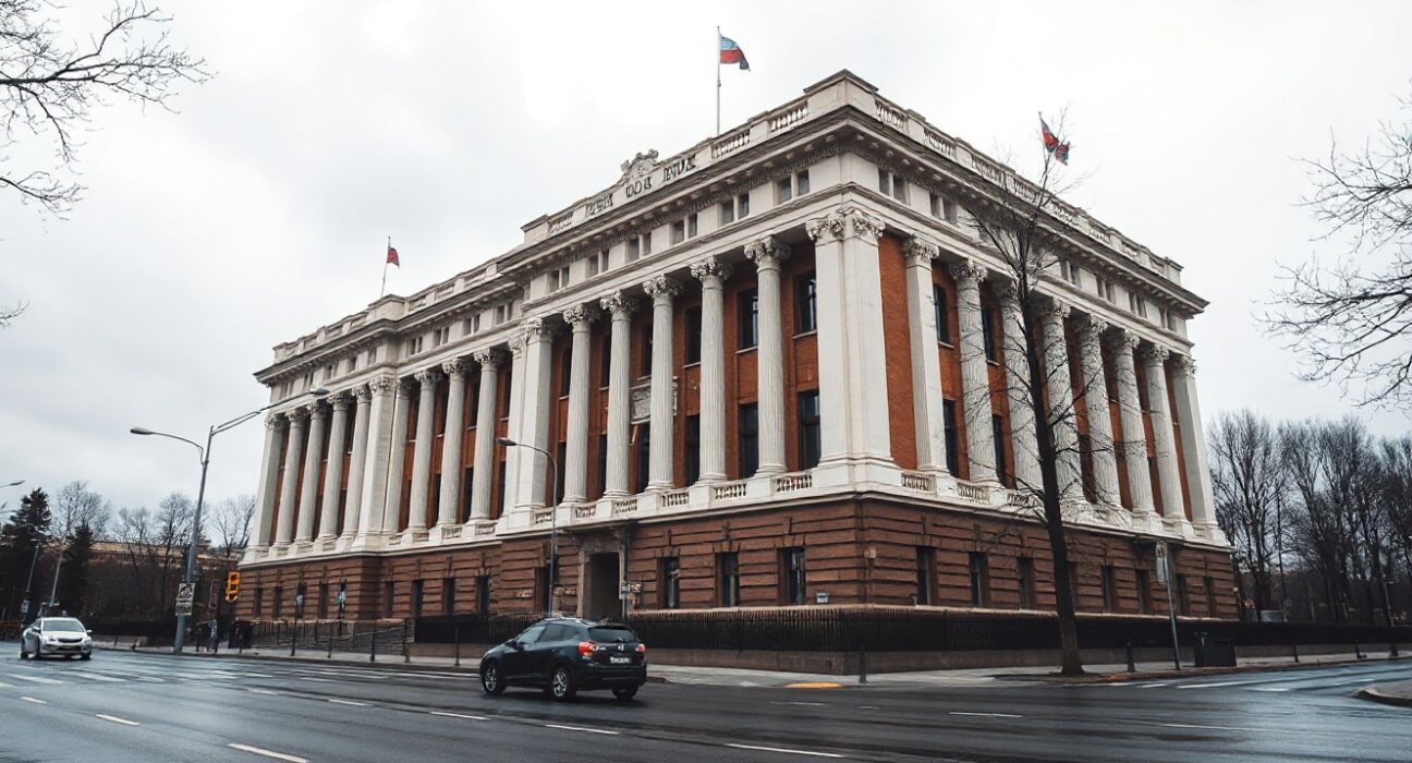 Exterior of the Russian State Duma building in Moscow under overcast sky