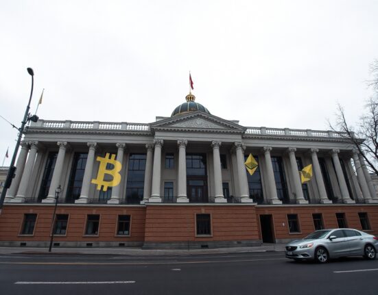 Exterior of the Russian State Duma building in Moscow with subtle cryptocurrency symbols in reflection