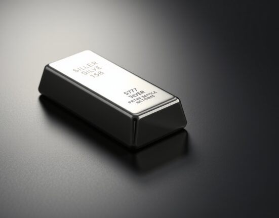 Close-up of a polished silver bar on a dark reflective surface with subtle chart lines in the background