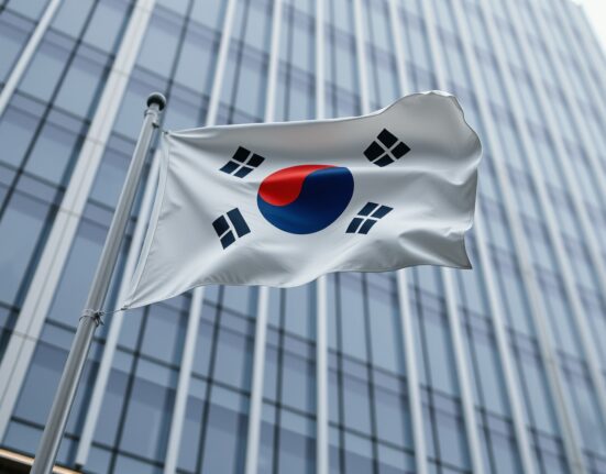South Korean flag in front of modern Seoul office building, representing AI-driven export growth and currency outlook
