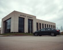Exterior of a state government building under overcast skies, representing the investigation into OpenAI.