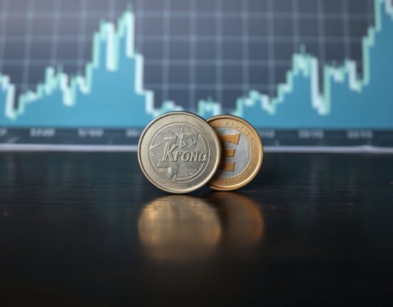 Swedish Krona and Euro coins on a desk with a financial chart background