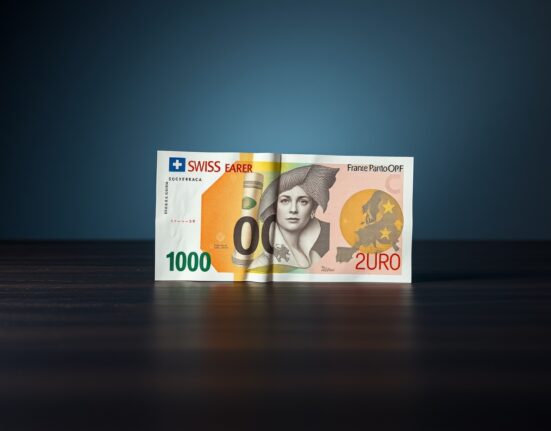 Swiss Franc and Euro banknotes on a desk, illustrating forex risk analysis from ING.