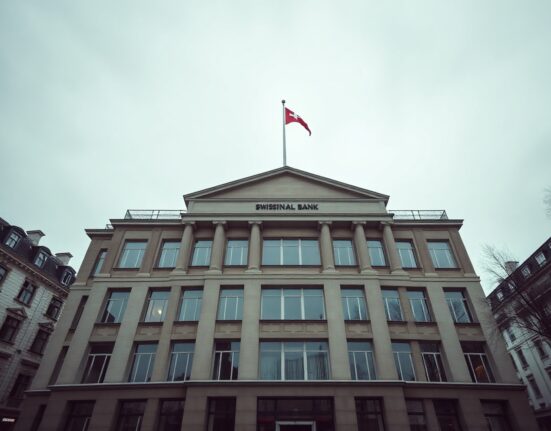 Swiss National Bank building in Bern under grey sky, representing steady monetary policy.