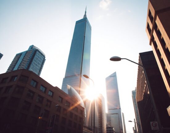 Taipei 101 tower and city skyline at golden hour, symbolizing Taiwan's economic growth