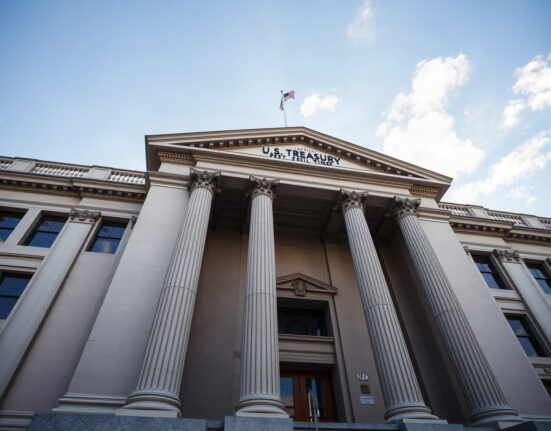 U.S. Treasury Building in Washington, D.C., with clear sky, symbolizing economic policy and bond market outlook.