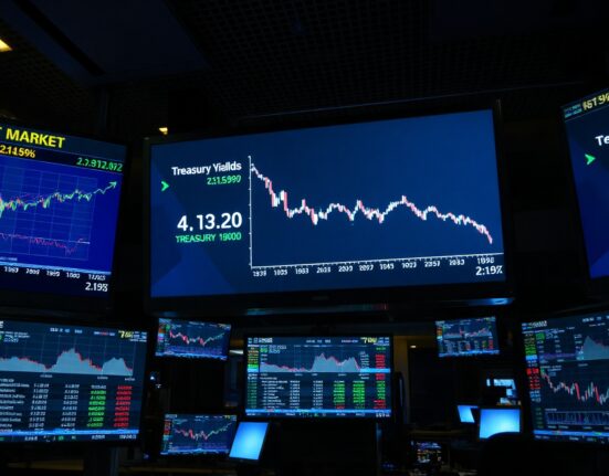 Financial market screens showing Treasury yield charts as investors await CPI report
