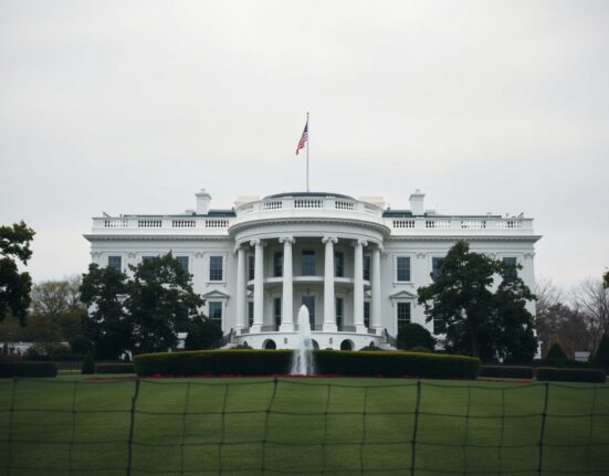 White House exterior on a cloudy day, representing the setting of Trump's statement on Iran.