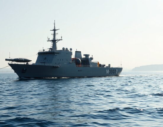Mine countermeasures vessel conducting operations in the Strait of Hormuz following Trump's announcement on Iran sea mines.