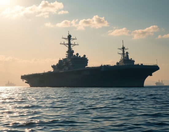 US Navy warships enforcing a naval blockade on Iran in the Persian Gulf, linked to nuclear deal negotiations.