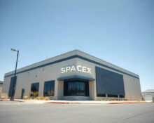 Exterior view of the SpaceX headquarters building in Hawthorne, California.
