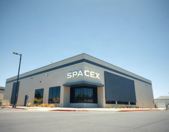 Exterior view of the SpaceX headquarters building in Hawthorne, California.