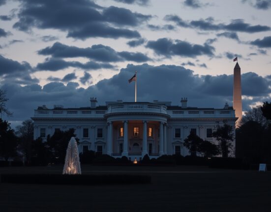 The White House at dusk with a single lit window in the Oval Office, signaling high-level national security discussions.