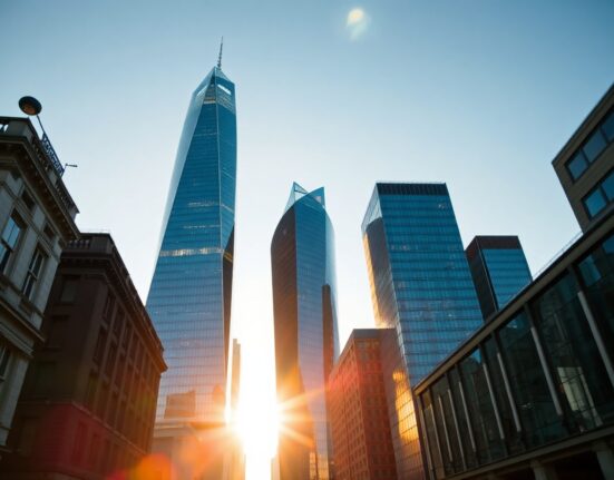 London financial district skyline at sunset, representing UK business investment growth