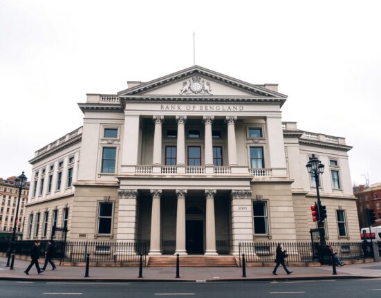 Bank of England building in London on a cloudy day, representing UK monetary policy and inflation analysis.