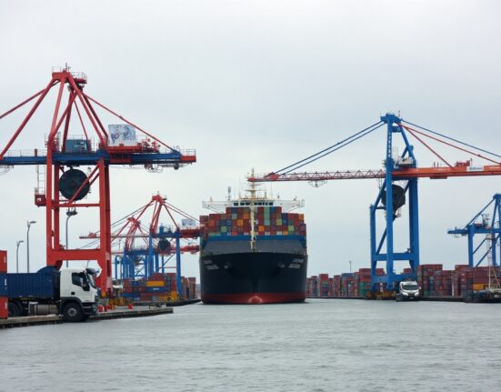 Container port in the UK, symbolizing trade activity, on a cloudy day
