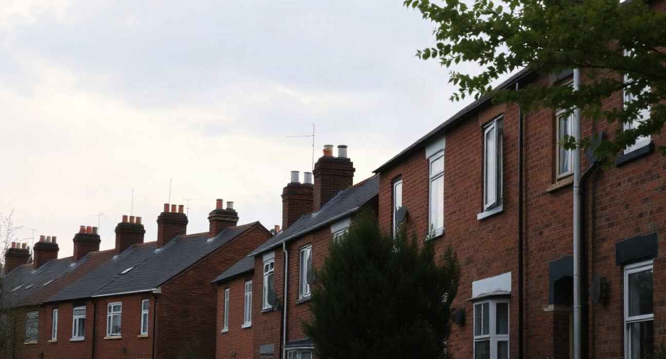 Rows of UK terraced houses under a cloudy sky, representing the housing market in June