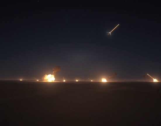 Night sky over Middle Eastern desert with explosions from US airstrikes on Iranian targets
