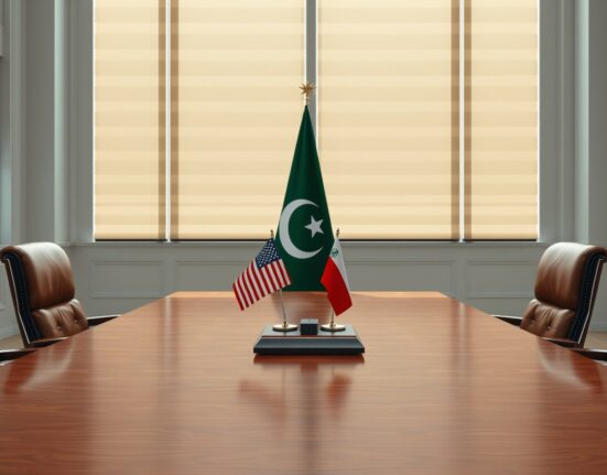 Diplomatic table setup for US-Iran negotiations in Pakistan with American and Iranian flags