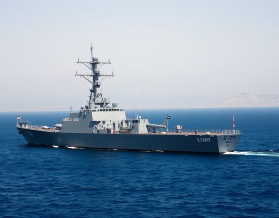 U.S. Navy destroyer enforcing the naval blockade in the strategic Gulf of Oman waterway.