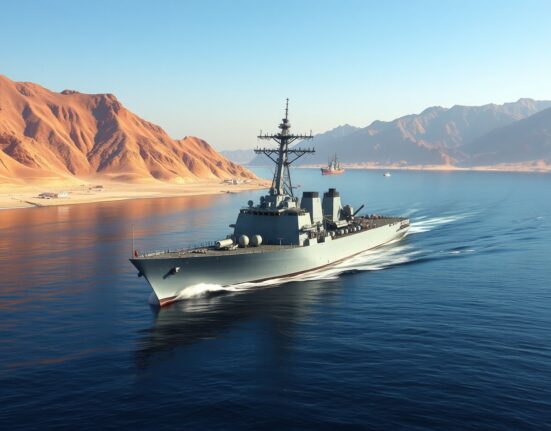US Navy destroyer transiting Strait of Hormuz without Iranian coordination during regional tensions