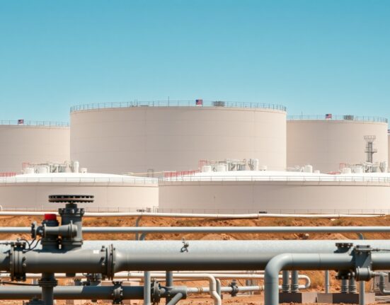 Aerial view of US Strategic Petroleum Reserve tank farm under clear daylight